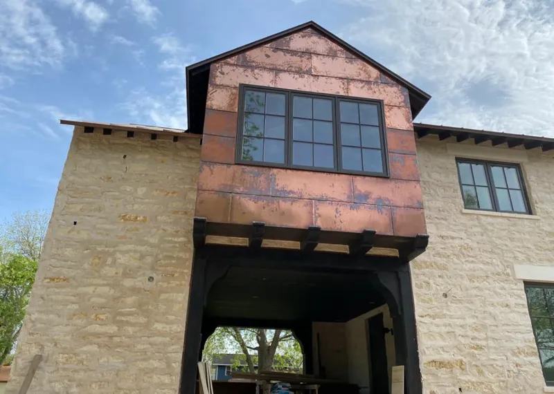 Copper metal panel facade on a stone building for Metal Roof Coating in Ramapo